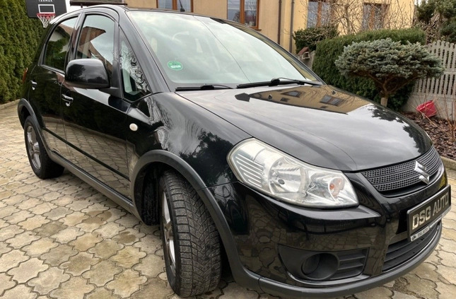 Suzuki SX4 cena 19900 przebieg: 143000, rok produkcji 2008 z Wisła małe 497